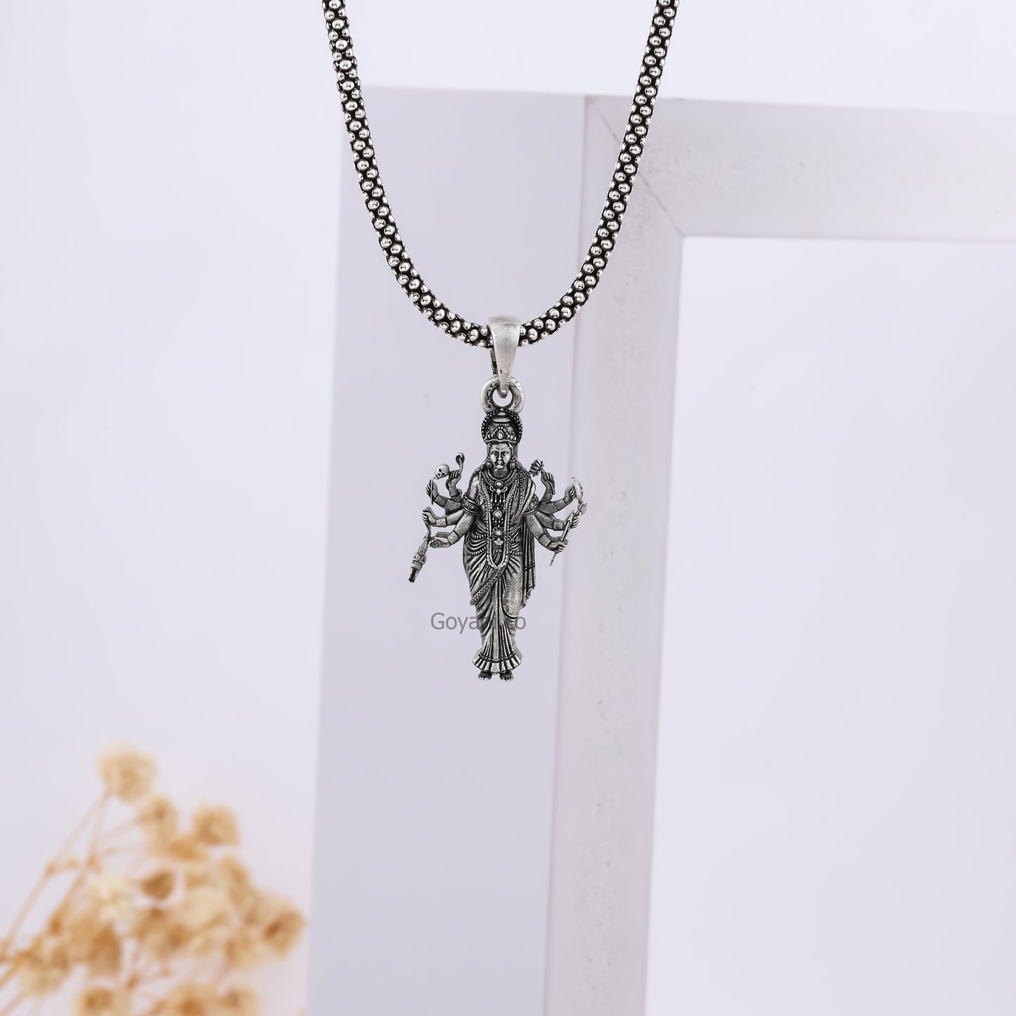 Premium Sadhi Maa pendant on display,